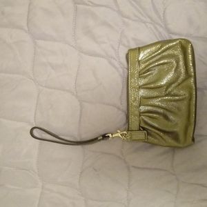 Vintage Like new Coach Wristlet with detachable strap.  Gun metal gray color.